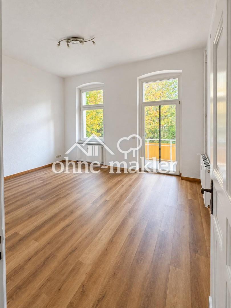 Helle 2-Zimmer-Altbauwohnung mit großem Südbalkon in zentraler Lage - Foto 2