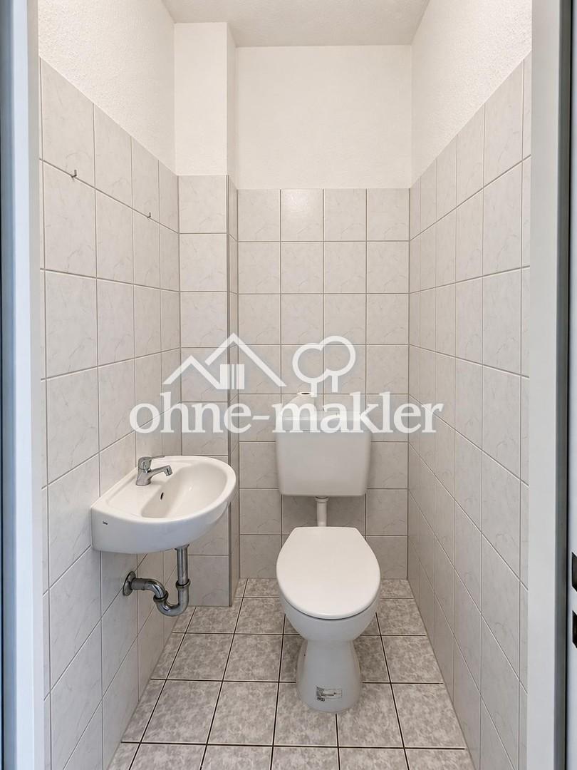 Helle 2-Zimmer-Altbauwohnung mit großem Südbalkon in zentraler Lage - Foto 5