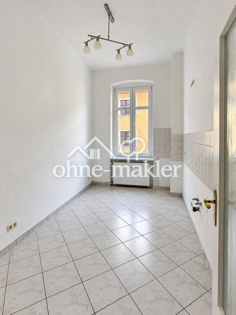 Helle 2-Zimmer-Altbauwohnung mit großem Südbalkon in zentraler Lage - Foto 3