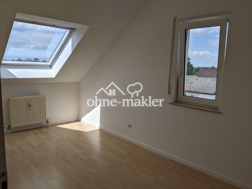 Helle Dachgeschosswohnung mit Dachterrasse und Tiefgaragenstellplatz - Foto 3