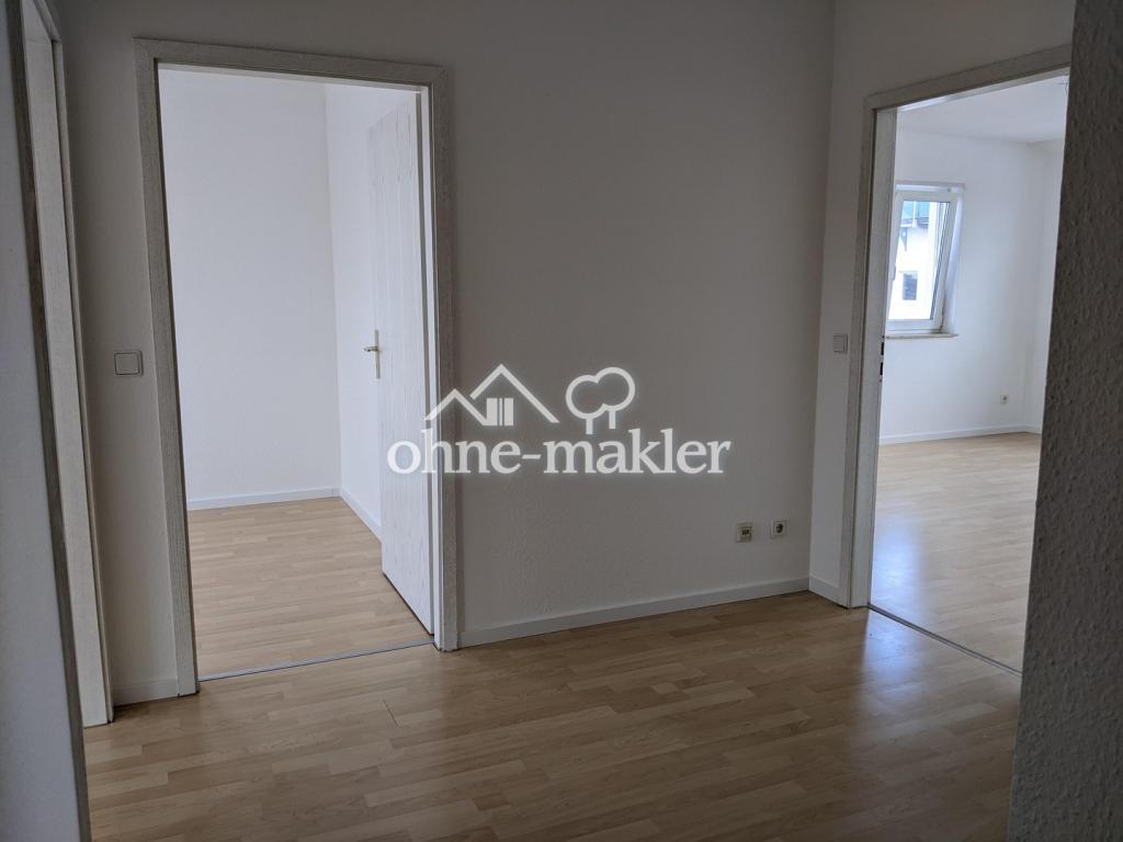 Helle Dachgeschosswohnung mit Dachterrasse und Tiefgaragenstellplatz - Foto 5