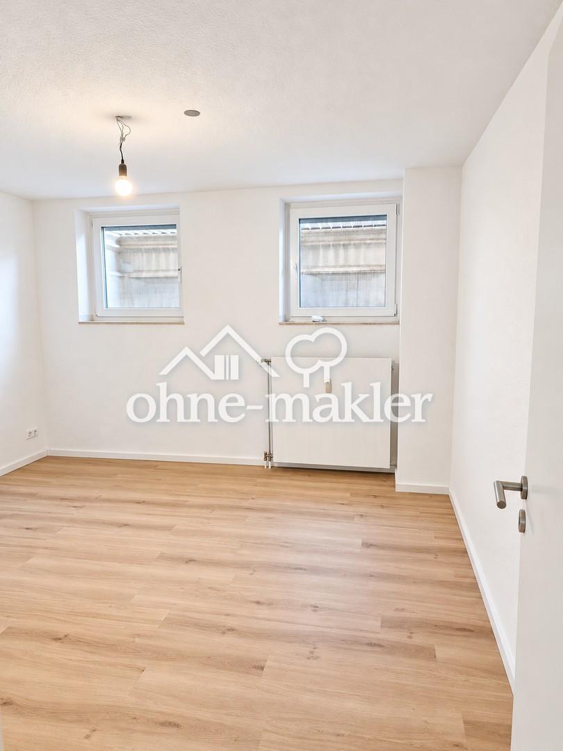 Helle, modernisierte Souterrainwohnung mit neuer Küche & Gartennutzung - Foto 2