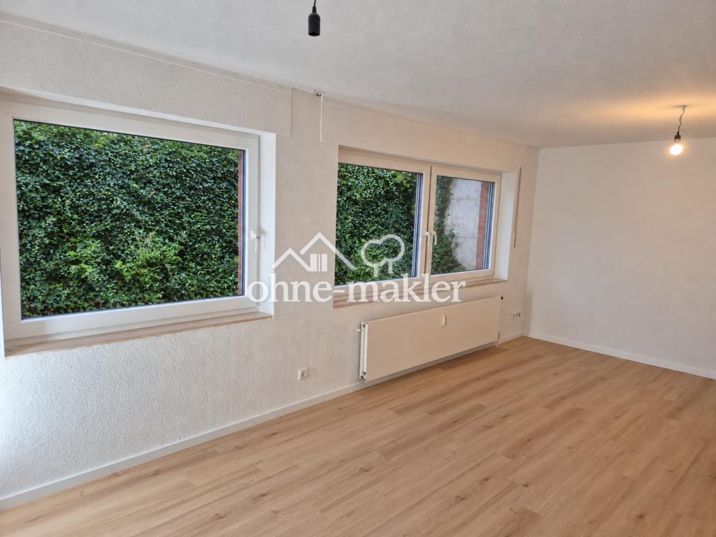 Helle, modernisierte Souterrainwohnung mit neuer Küche & Gartennutzung - Foto 1