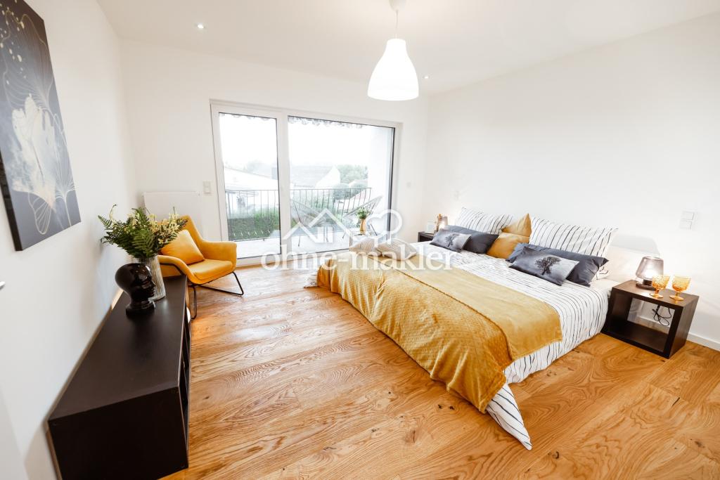 Moderne Traumwohnung im 2-MFH mit sonnigem Balkon im 1.OG, Energie KL. A - Photo 5