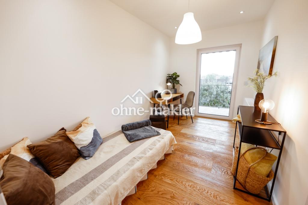 Moderne Traumwohnung im 2-MFH mit sonnigem Balkon im 1.OG, Energie KL. A - Photo 4