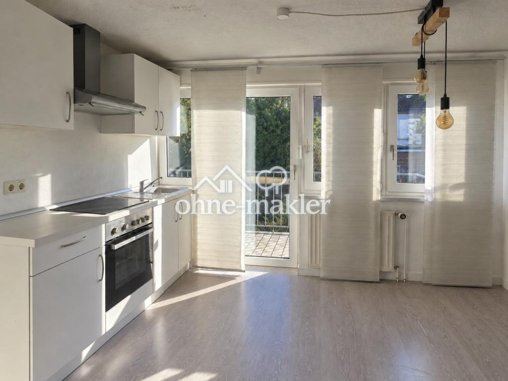 Gemütliche 2-Zimmer-Dachgeschosswohnung mit Balkon und Einbauküche in ruhiger Lage - Foto 1