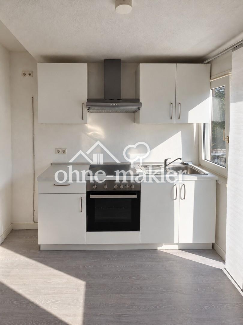 Gemütliche 2-Zimmer-Dachgeschosswohnung mit Balkon und Einbauküche in ruhiger Lage - Foto 3