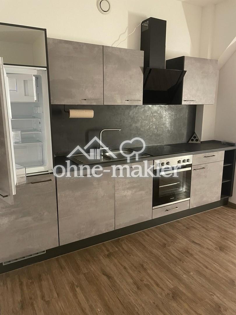 Noch dieses Jahr neu durchstarten: Helle 2-Zimmer-Wohnung mit Balkon im Herzen von Walldürn - Foto 3