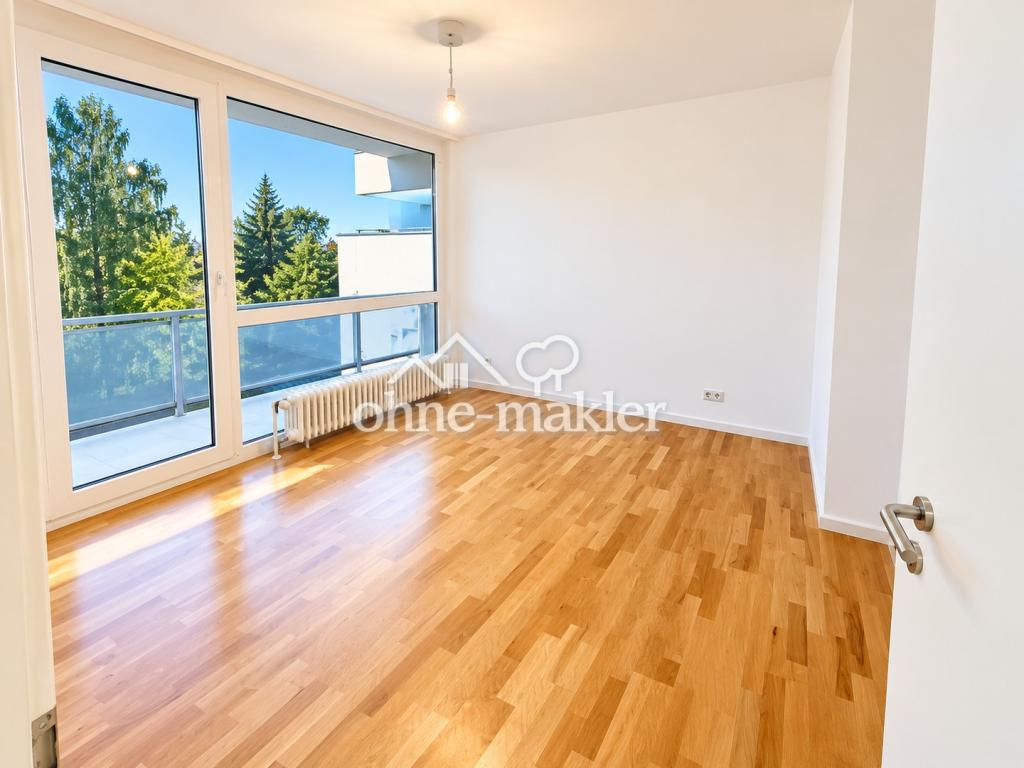 Lichtdurchflutete 2 Zimmer Wohnung in zentraler, aber ruhiger Lage von Unterhaching - Foto 1