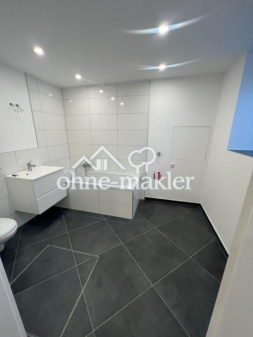 Moderne Souterrainwohnung mit Garten - Foto 5