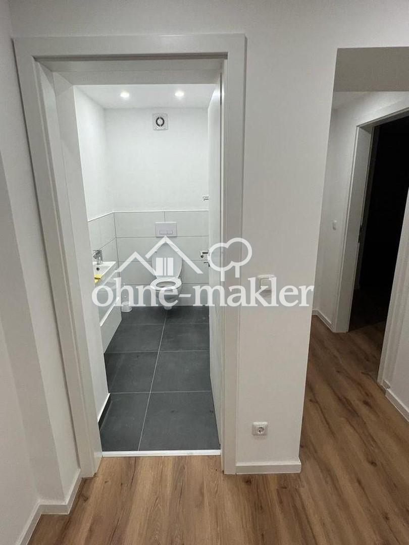 Moderne Souterrainwohnung mit Garten - Foto 4