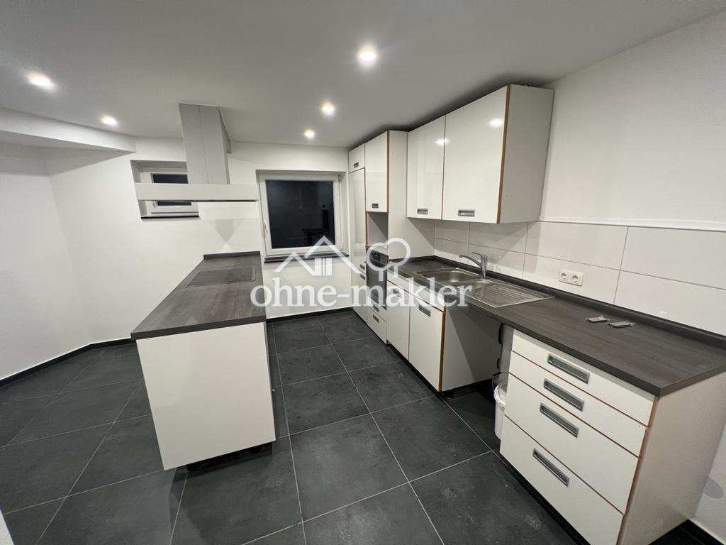Moderne Souterrainwohnung mit Garten - Foto 3