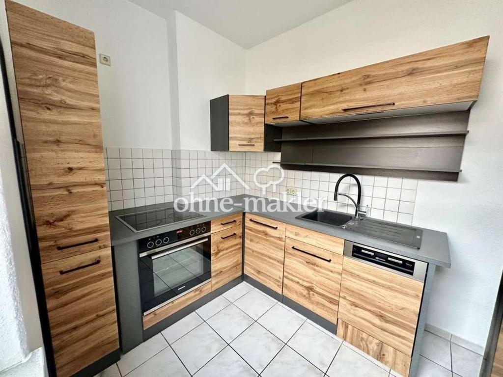 Gemütliche 2-Zimmer-Etagen-Wohnung mit Einbauküche und Balkon in Magdeburg - Foto 3