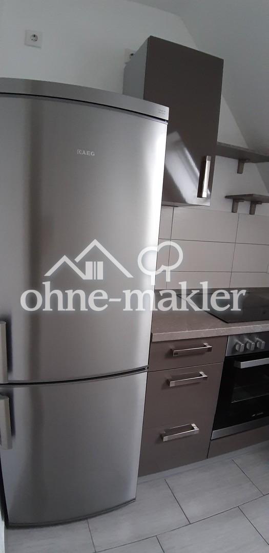 Gemütliche Dachgeschosswohnung mit moderner Einbauküche - Photo 3