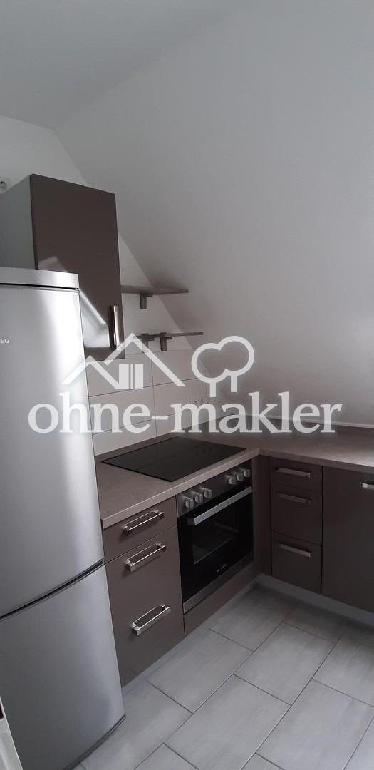 Gemütliche Dachgeschosswohnung mit moderner Einbauküche - Photo 4