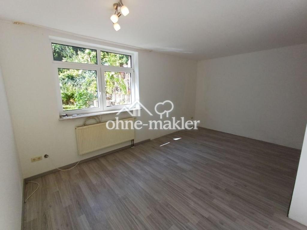 ANFRAGESTOPP!! 3-Zimmer-Souterrainwohnung mit Terrasse in Sandhatten - Foto 1