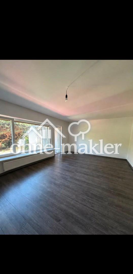 WOHNEN MIT WEITBLICK - Großzügige 3,5-Z-Erdgeschosswohnung mit Terrasse und Traumgarten - Photo 1