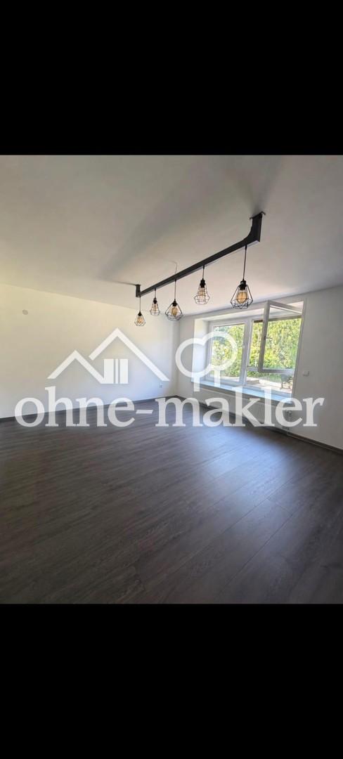 WOHNEN MIT WEITBLICK - Großzügige 3,5-Z-Erdgeschosswohnung mit Terrasse und Traumgarten - Photo 3