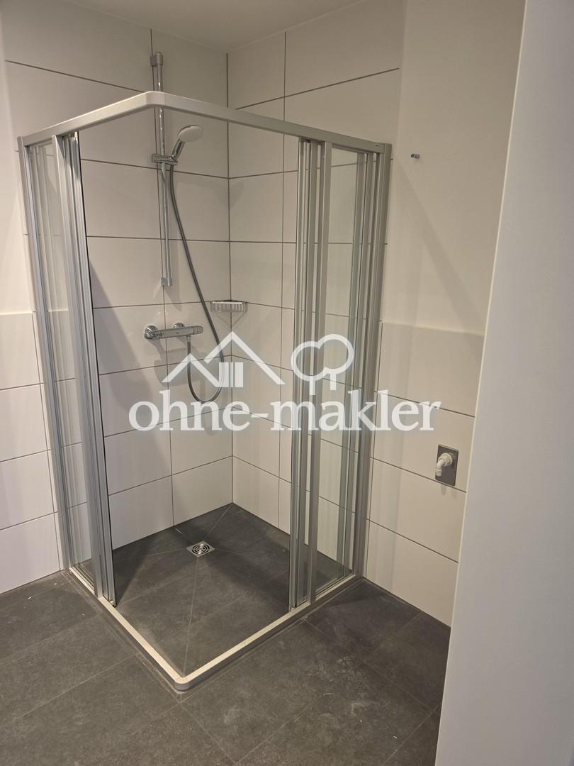 Erstbezug: Moderne Wohnung im 1. Obergeschoss mit Balkon sowie energieeffizientem Wohnkomfort - Photo 4