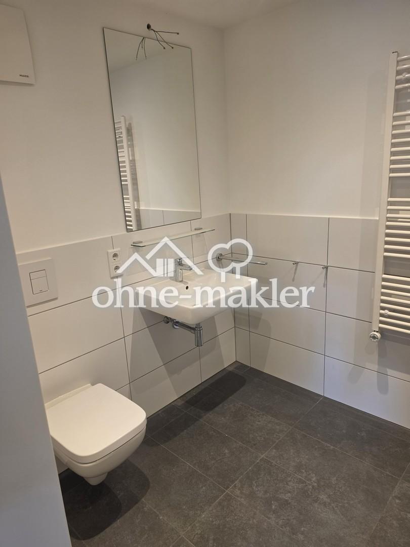 Erstbezug: Moderne Wohnung im 1. Obergeschoss mit Balkon sowie energieeffizientem Wohnkomfort - Photo 3