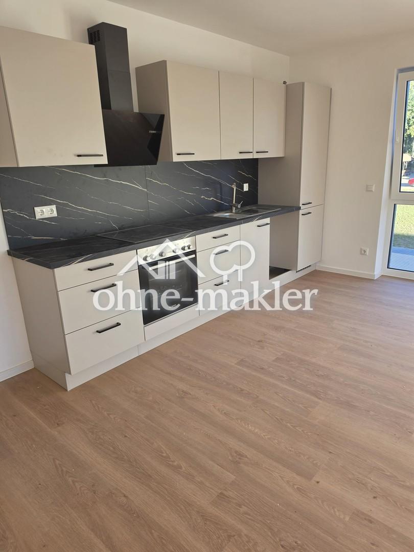 Erstbezug: Moderne Wohnung im 1. Obergeschoss mit Balkon sowie energieeffizientem Wohnkomfort - Photo 2