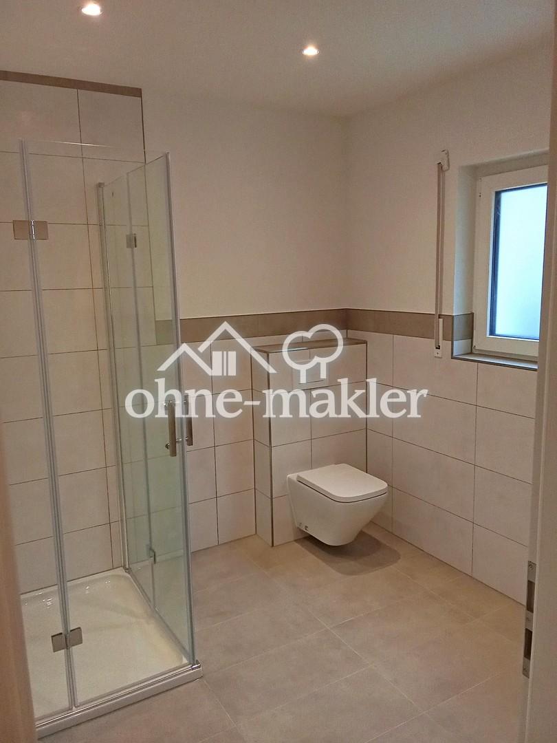Erstbezug 2 Zimmer Wohnung mit eigenem Garten und Garage - Photo 4
