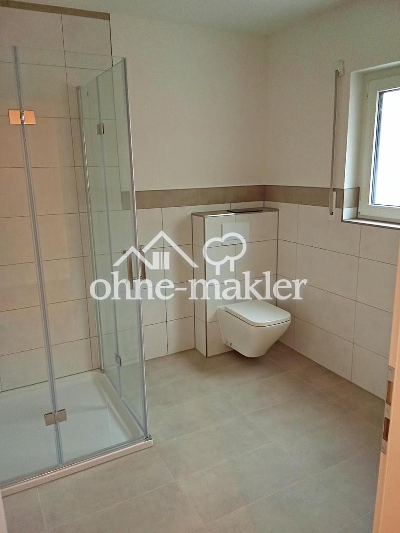 Erstbezug 2 Zimmer Wohnung mit eigenem Garten und Garage - Photo 3