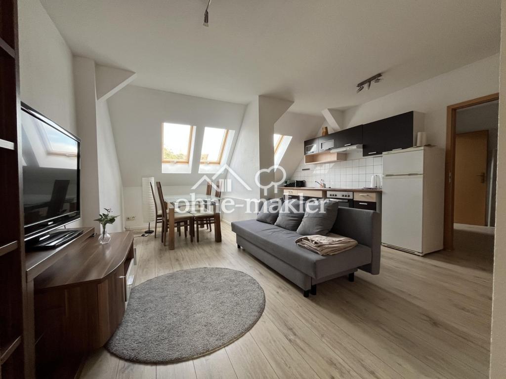 teilmöblierte DG-Wohnung mit EBK - Photo 2