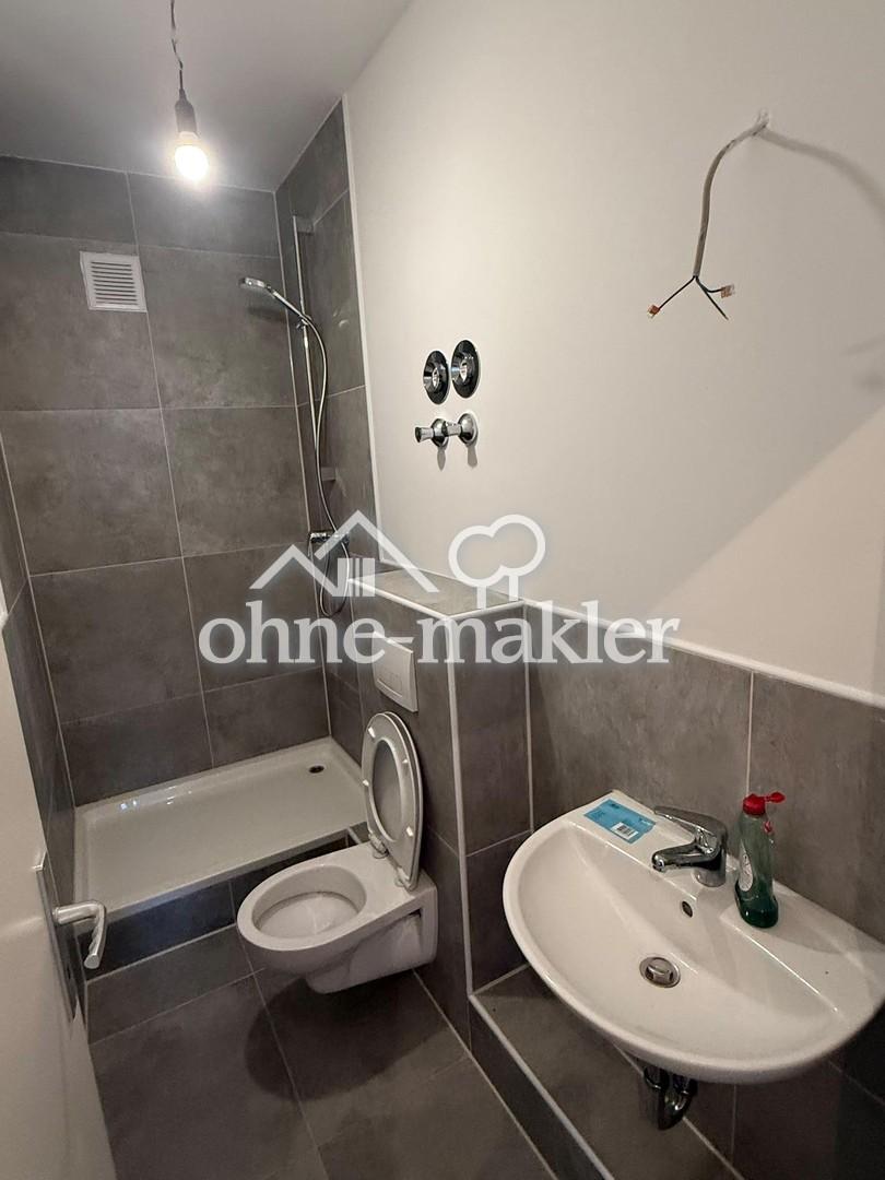 Frisch kernsanierte Wohnung mit Balkon & Fußbodenheizung in Ratingen-Zentrum - Foto 1