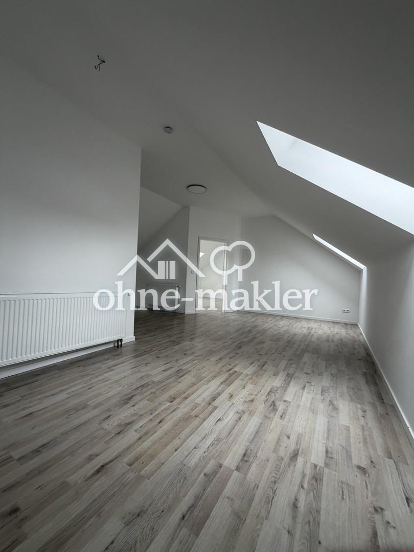 Helle 2-Zimmer-Dachgeschosswohnung in ruhiger Lage in Sandweier bei Baden-Baden - Photo 4