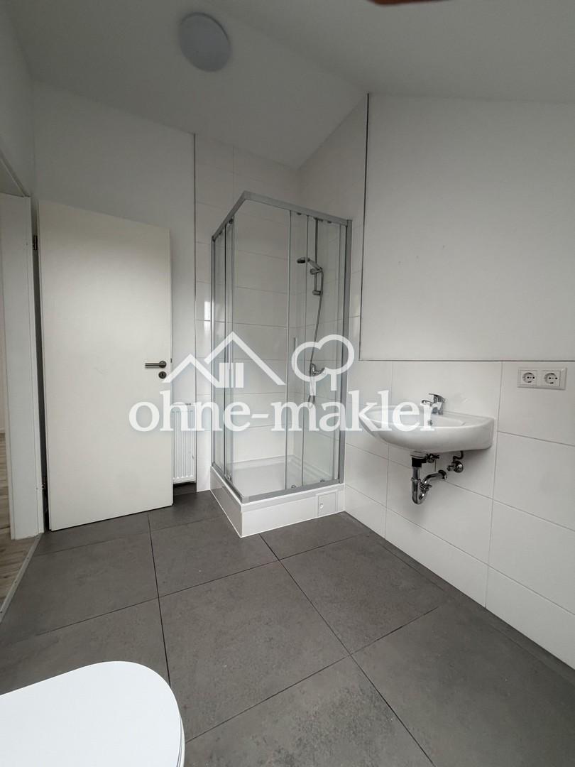 Helle 2-Zimmer-Dachgeschosswohnung in ruhiger Lage in Sandweier bei Baden-Baden - Photo 1
