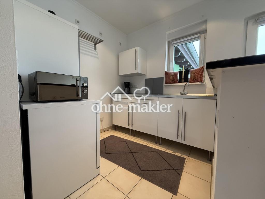 Schöne 2-Zimmer-Wohnung mit Terrasse und Einbauküche - Photo 5