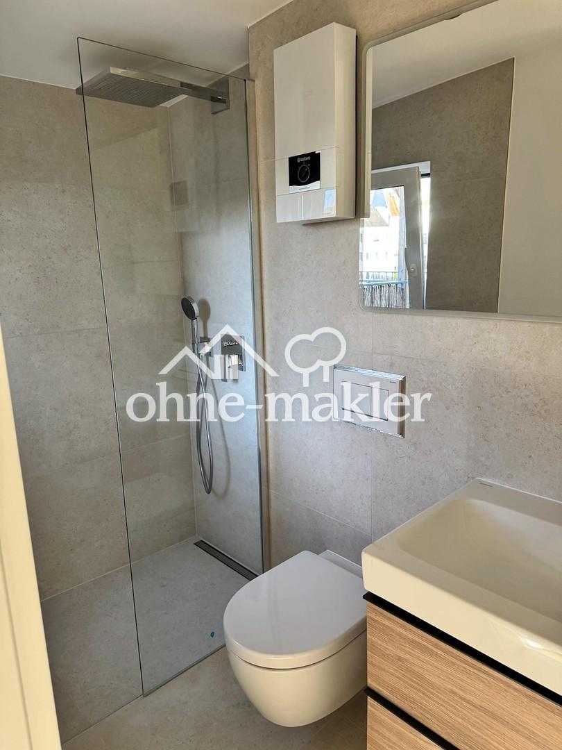 Erstbezug nach Sanierung | Dachterrasse | Walk-in-Dusche | Einbauküche | Highspeed-Internet - Foto 4