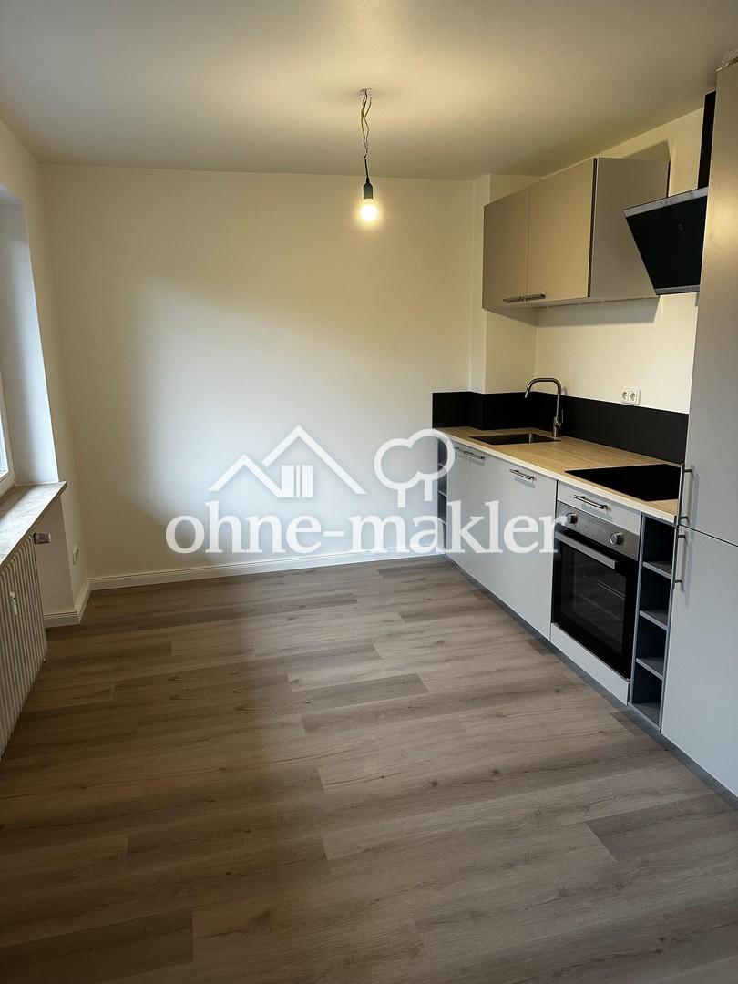 Sanierte 3 Zimmer Wohnung mit offener Wohnküche, Balkon und Gartennutzung, ruhig nahe Stadtpark - Photo 2
