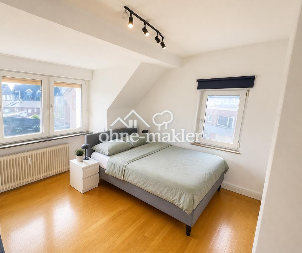Helle Dachgeschosswohnung mit großzügigem Raumangebot in Meerbusch-Lank-Latum - Foto 4