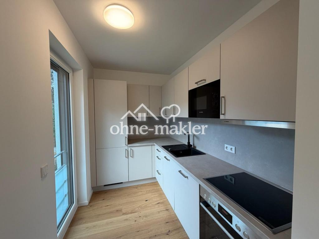 Erstbezug im Neubau: 2 Zimmer mit Einbauküche, Parkett und Fußbodenheizung am Hachinger Bach - Foto 5