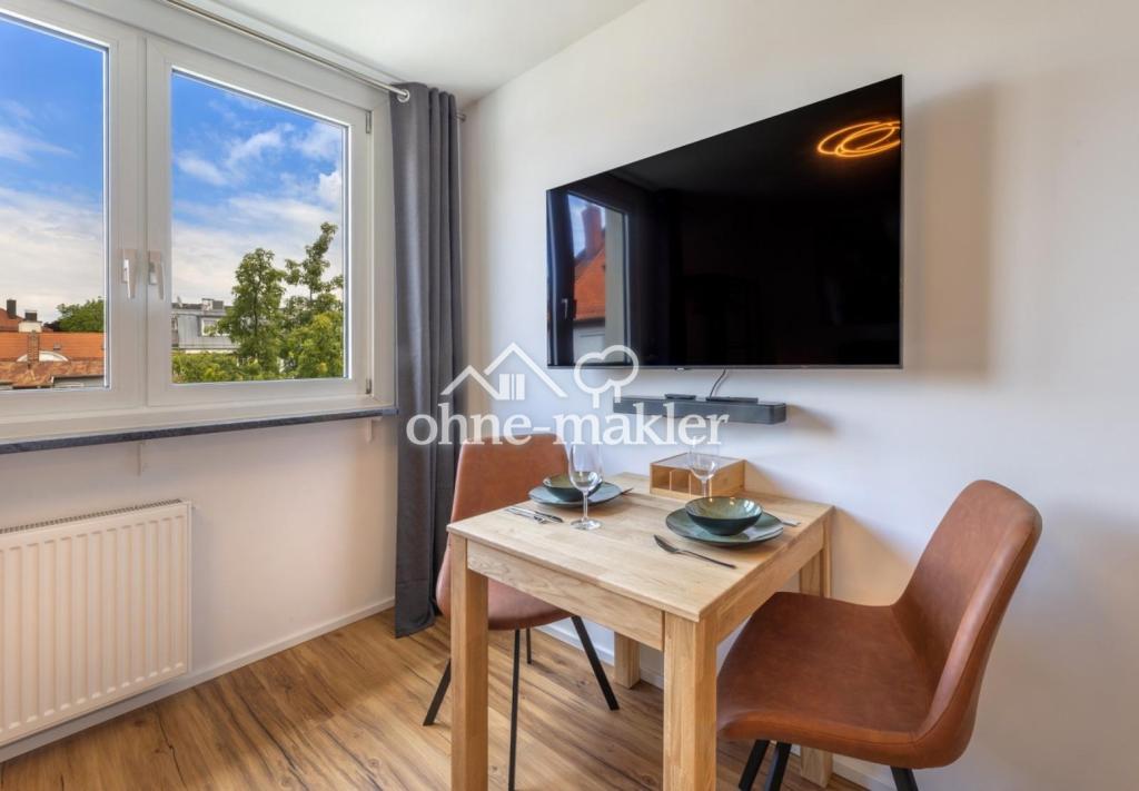 Exklusiv möbliert im Herzen Münchens: ruhiges Apartment im Lehel nahe Eisbach und Isar - Foto 2