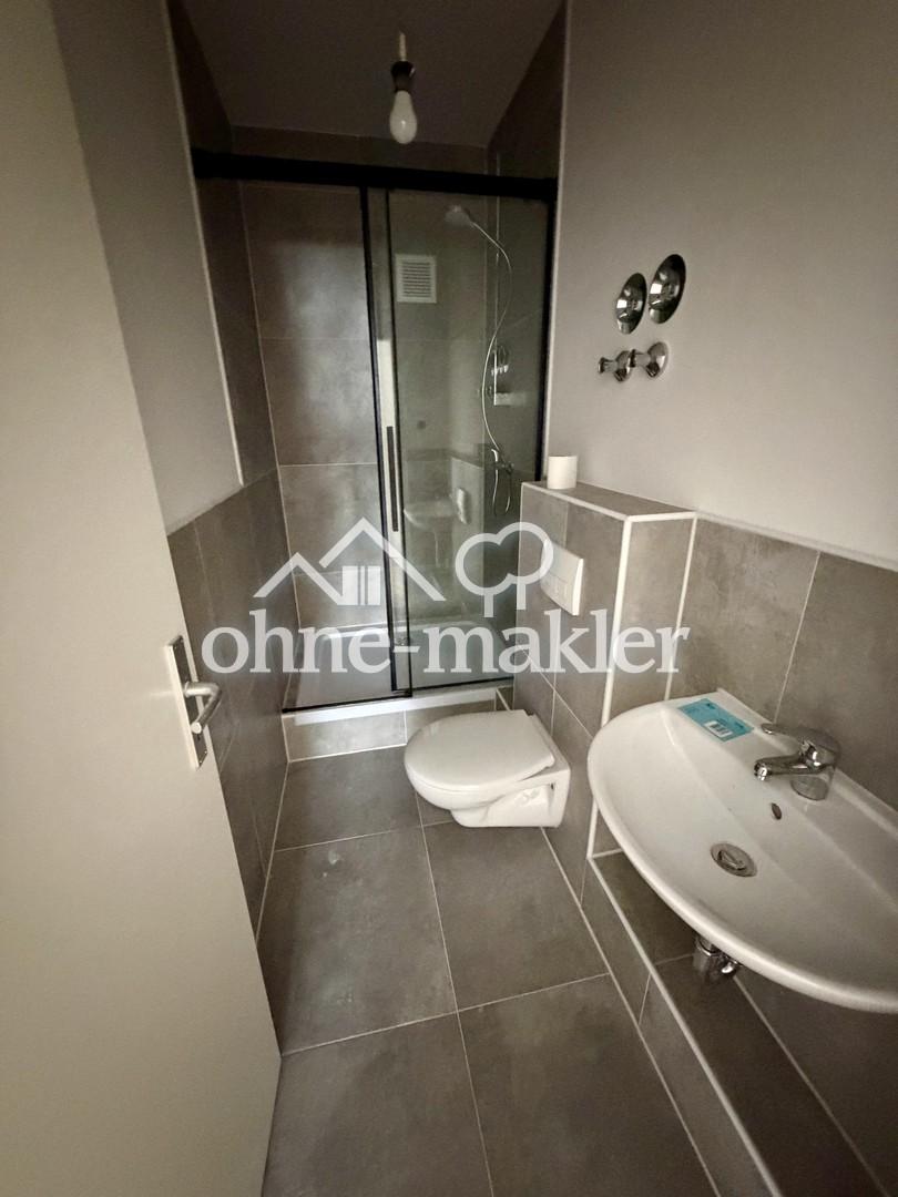 Frisch kernsanierte 1-Zimmer-Wohnung mit Balkon & Fußbodenheizung in Ratingen-Zentrum - Foto 1