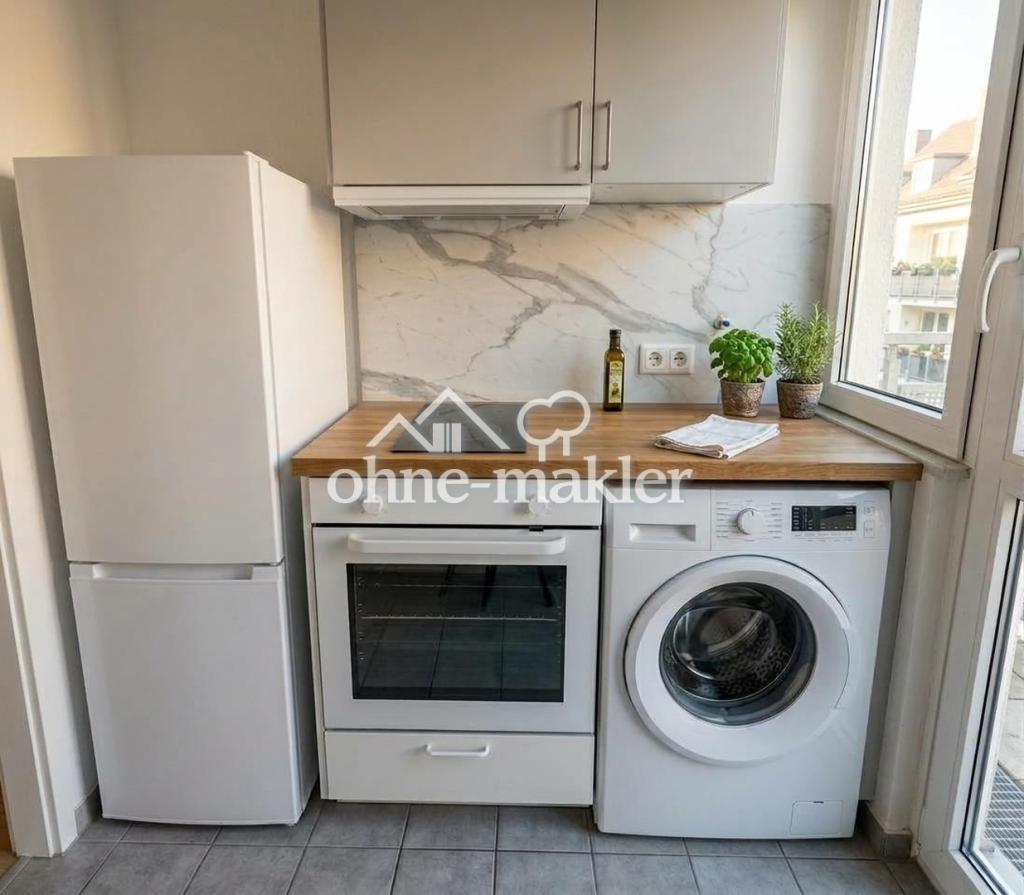 Helle 2-Zimmer-Dachgeschosswohnung mit Balkon, Einbauküche & TG-Stellplatz - Foto 2