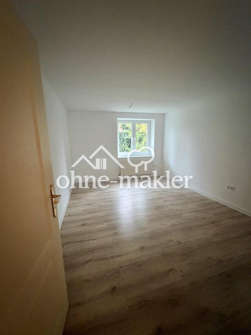 Renovierte 2-Zimmer-Wohnung im EG mit Südterrasse, Garten und Stellplatz - Photo 3
