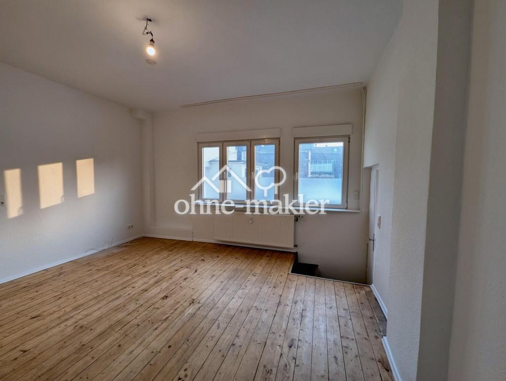 Eigener Eingang, Holzdielen & Schlafen unterm Dach: 2-Zimmer-Wohnung in Merscheid - Foto 4
