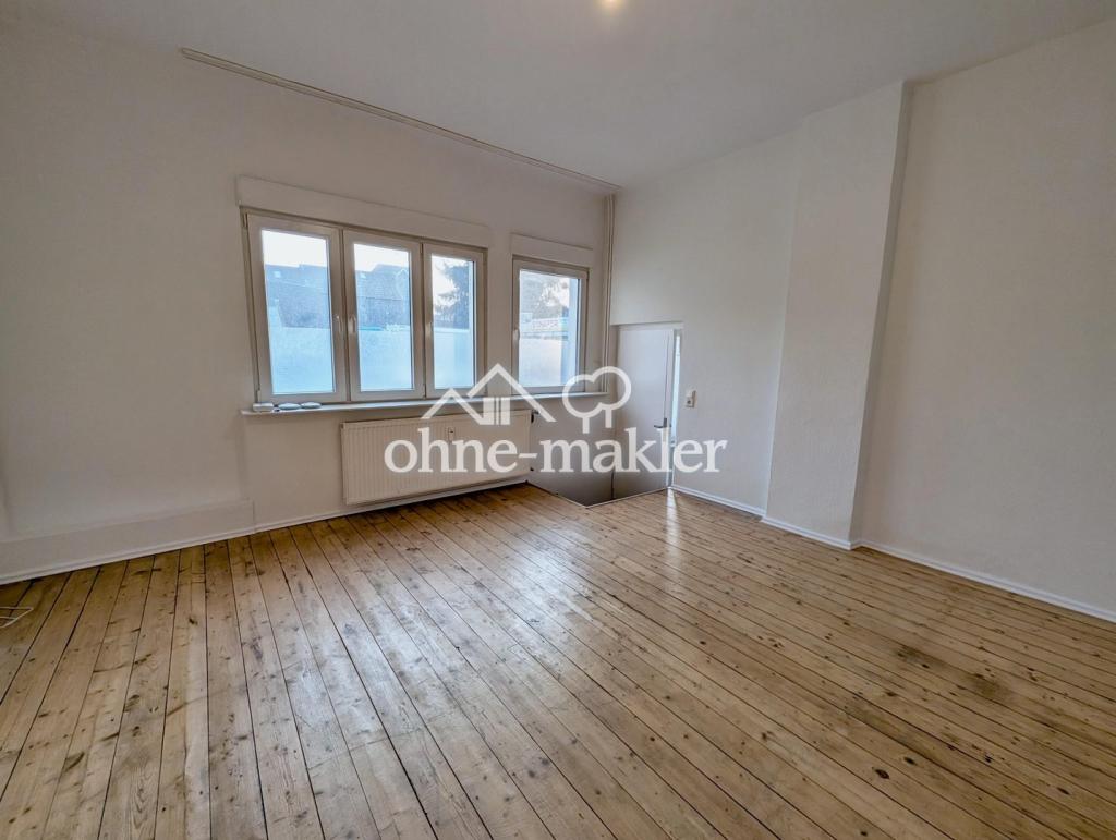 Eigener Eingang, Holzdielen & Schlafen unterm Dach: 2-Zimmer-Wohnung in Merscheid - Foto 1