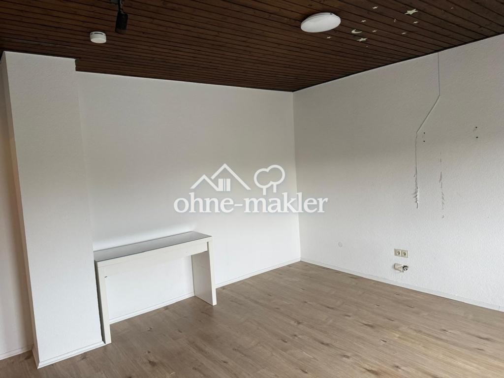Wohnen mit Kamin, Terrasse und Garten – großzügige 3,5-Zimmer-Wohnung in Solingen - Foto 4
