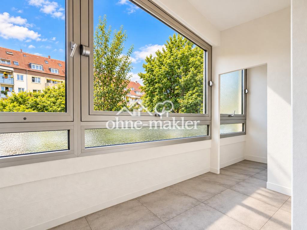 Erstbezug nach Sanierung! Stilvolle 2-Zimmer-Wohnung mit Wintergarten in TOP-Lage - Photo 5