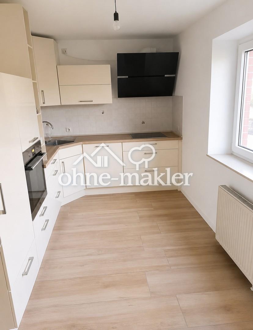 Schöne 4 Zimmer-Wohnung im EG mit großem Garten/Terasse, EBK, Garage - Photo 2