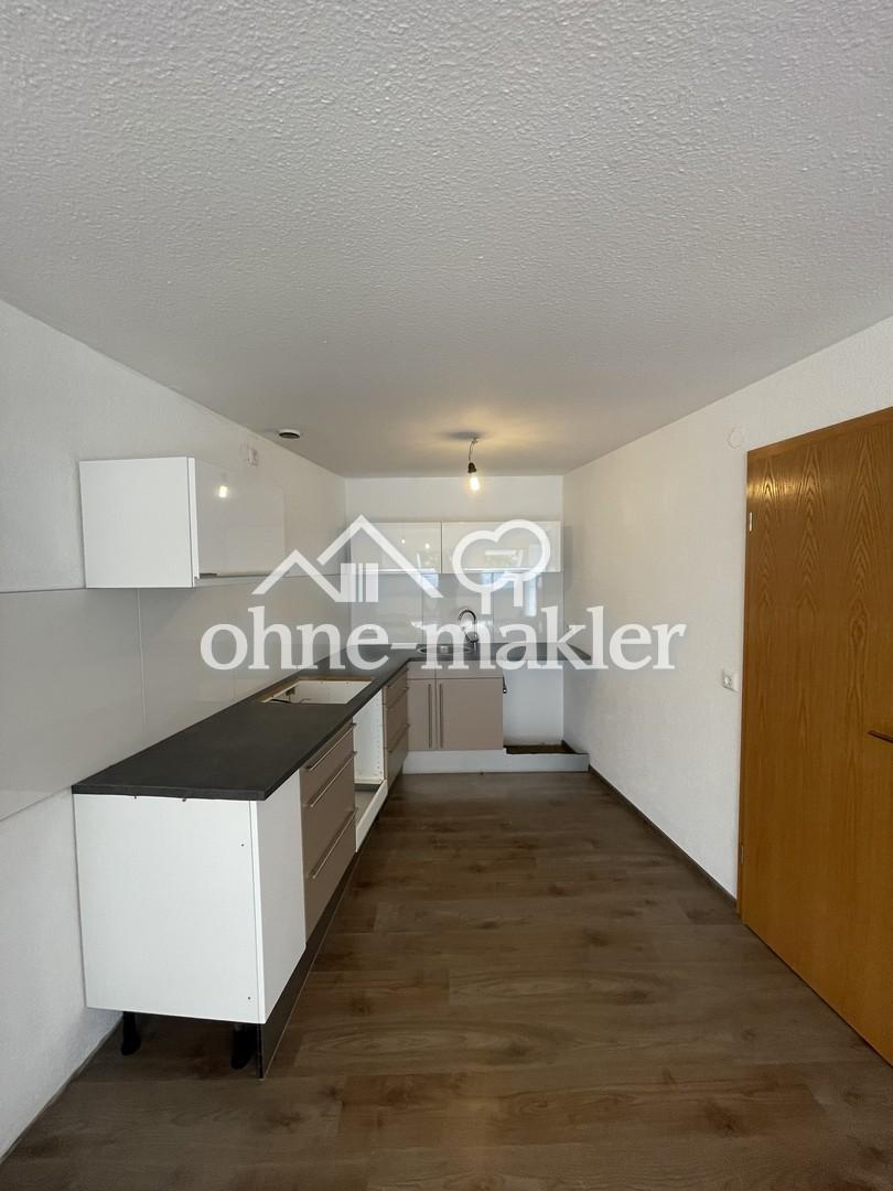 Renovierte 2-Zimmer Wohnung mit großer Dachterrasse und Stellplatz - Foto 4