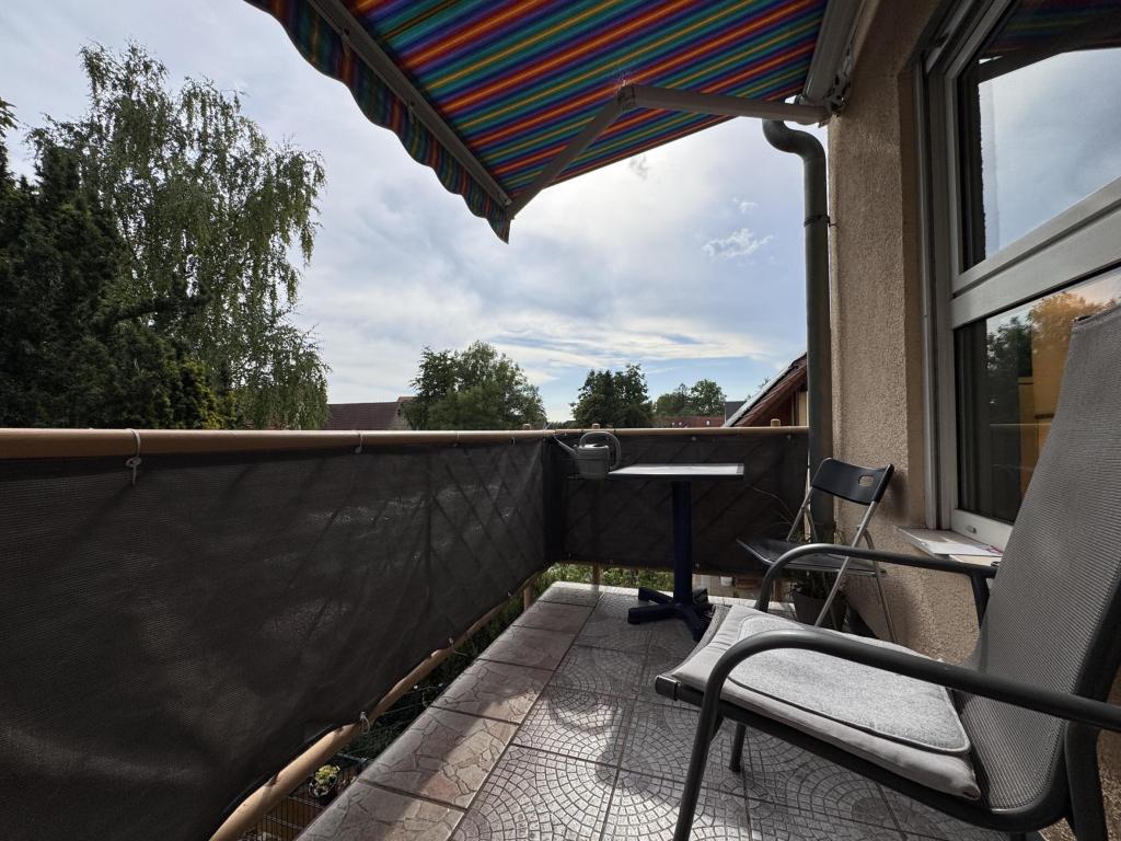 Balkon mit Markise