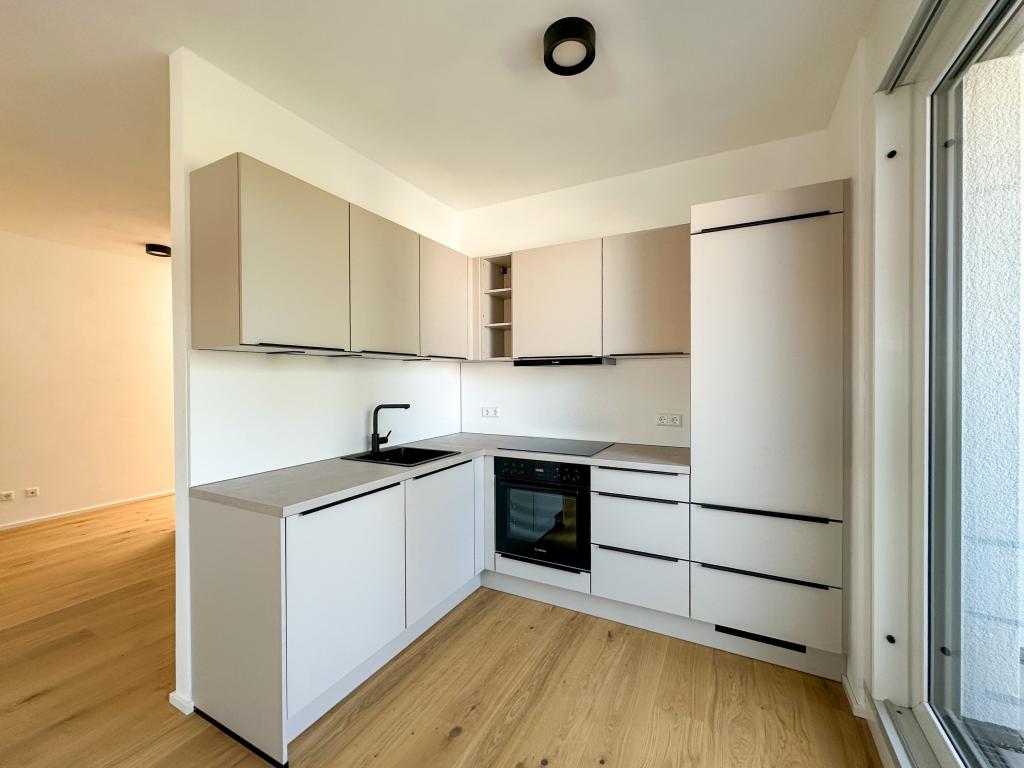 Erstbezug: Hochwertige 2-Zimmer-Neubauwohnung mit Tiefgaragenstellplatz! - Photo 2
