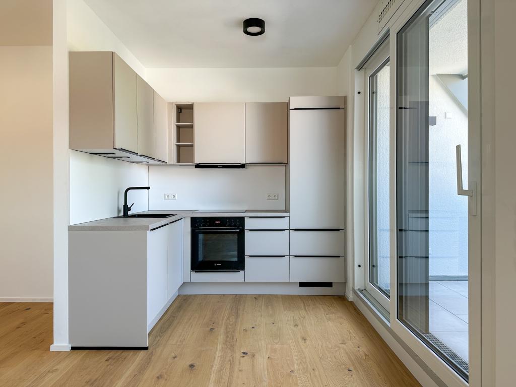 Erstbezug: Hochwertige 2-Zimmer-Neubauwohnung mit Tiefgaragenstellplatz! - Photo 1