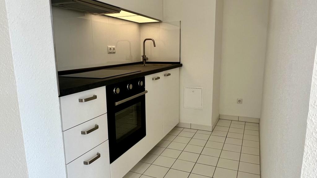 Lichtdurchflutete 1,5-Zimmer Wohnung im obersten Geschoss - Foto 3